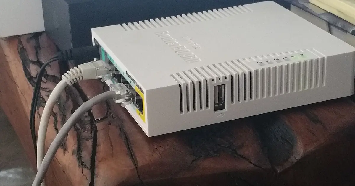 Home router beside a TV streaming setup